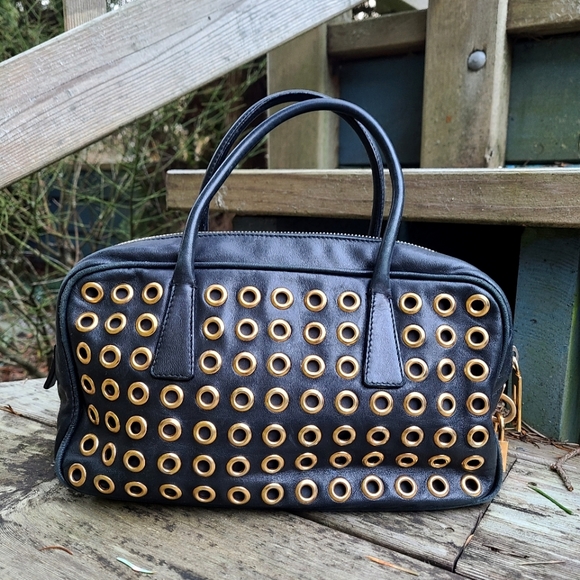 Prada Gold Grommet Black Leather Hand Bag w/ Lock and Keys - Picture 4 of 11